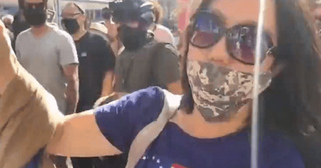 WATCH: Woman Wearing U.S. Flag Shirt Mobbed near San
Francisco Antifa Protest 1