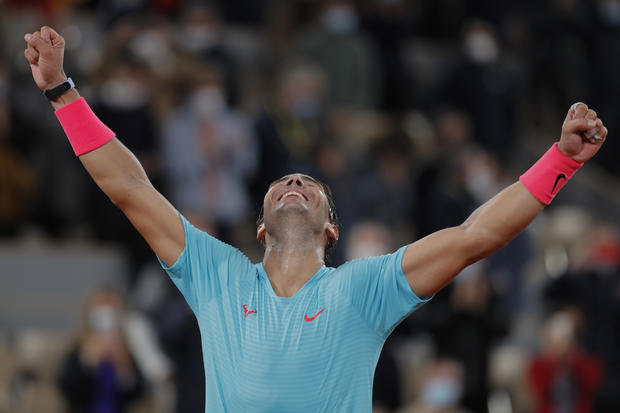 Nadal beats Djokovic at French Open, ties Federer's
record 1