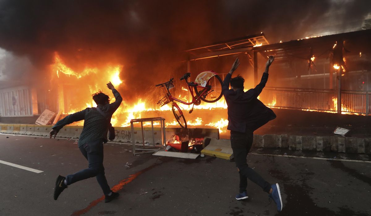 Jakarta cleans up after violent anti-labor law
protests 1