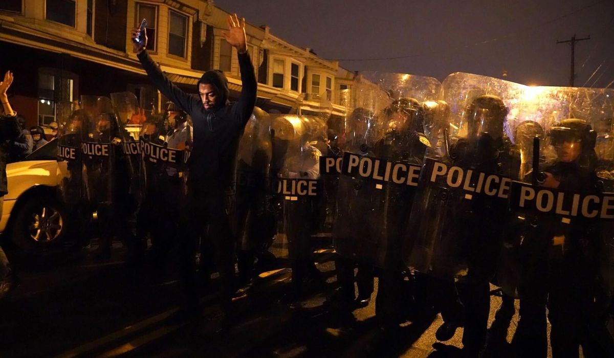 Protests flare in Philadelphia after police kill Black
man 1