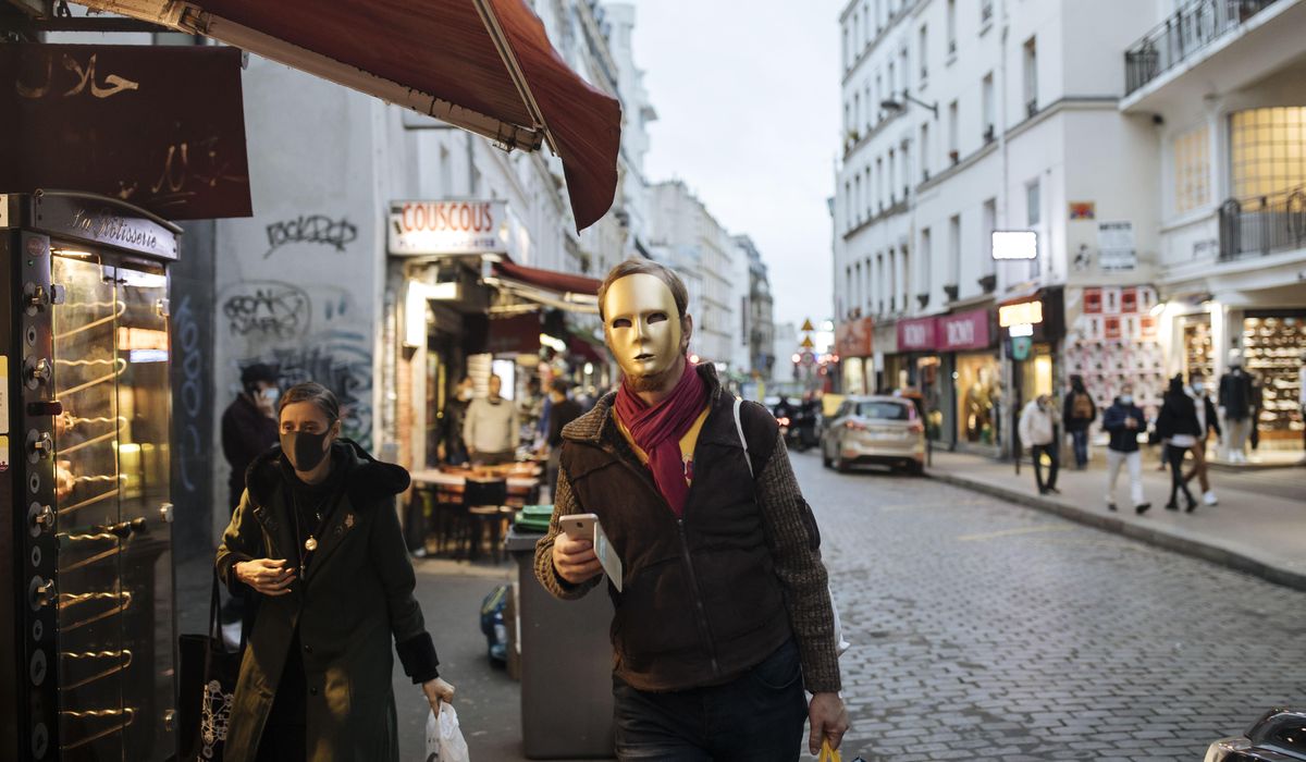 Empty Parisian sidewalks as France enters day 1 of
lockdown 1
