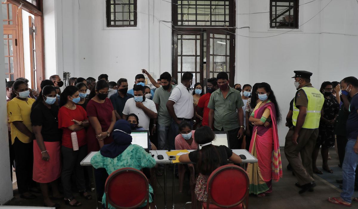 Sri Lanka closes key state offices as virus outbreak
surges 1