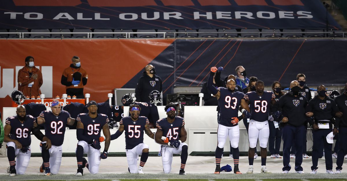 Bears protest racial injustice during national anthem at
Panthers game 1