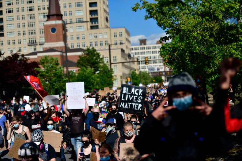 Video Shows Police Retreating From Protesters Hurling
Objects After Fatal Shooting of Walter Wallace 1