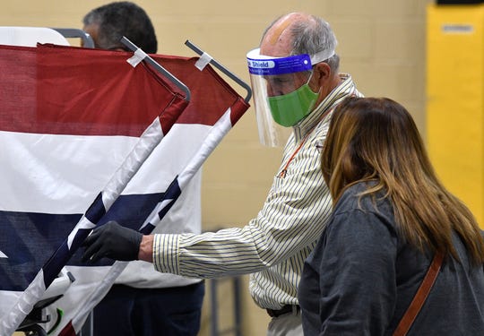 Tennessee voters with COVID-19 can now vote in-person at
special sites under new guidelines 1