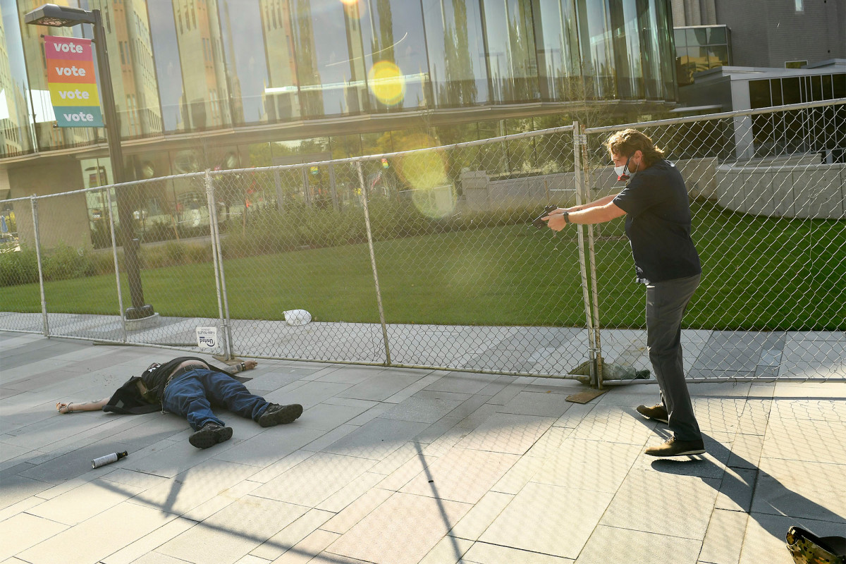 Photos capture moment Lee Keltner is shot dead amid dueling
Denver protests 1