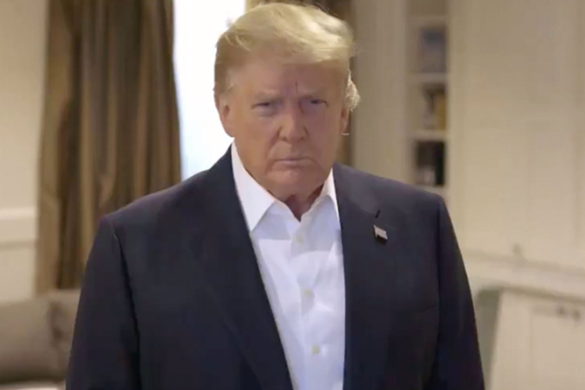Trump leaves hospital amid coronavirus battle, waves to
supporters 1