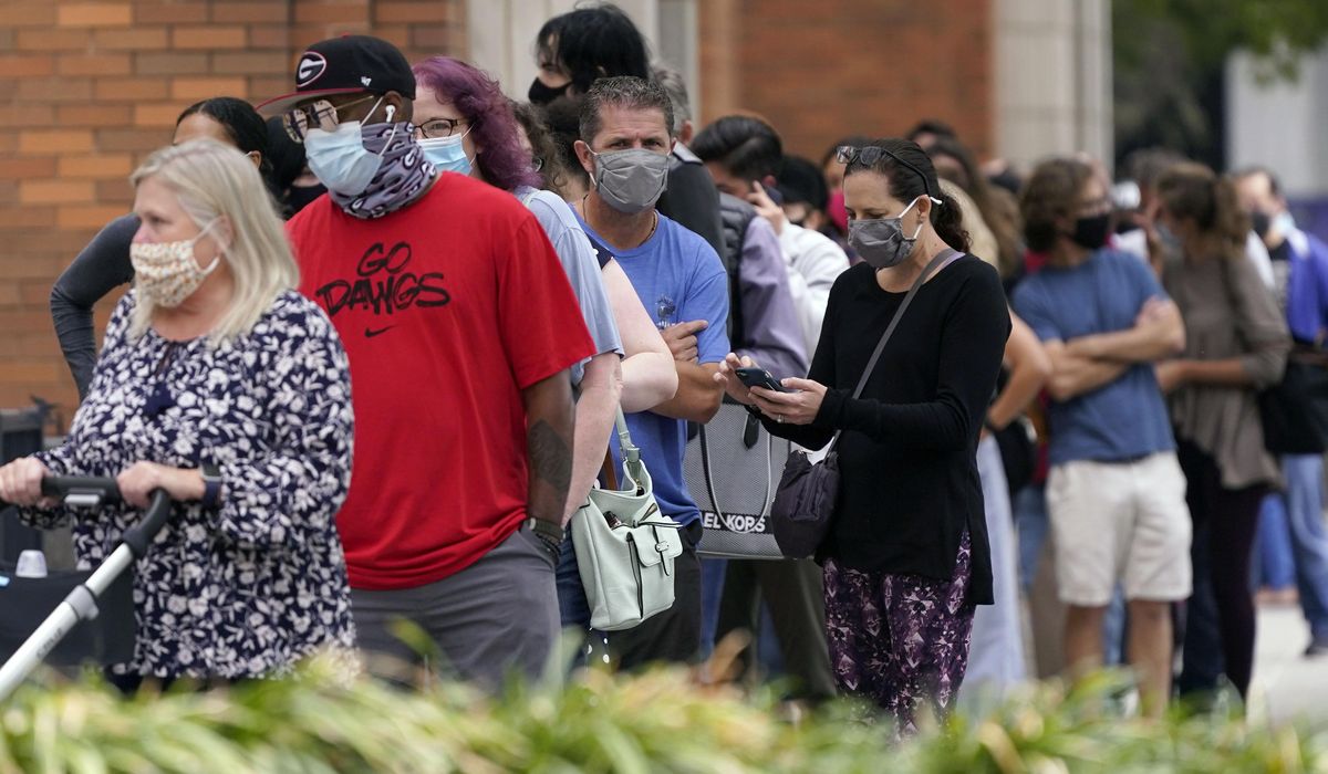 Judge says Texas mask mandate must extend to polling
places 1