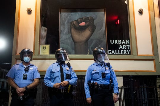 National Guard mobilizes as second night of Philadelphia
protests over Walter Wallace killing turn violent 1