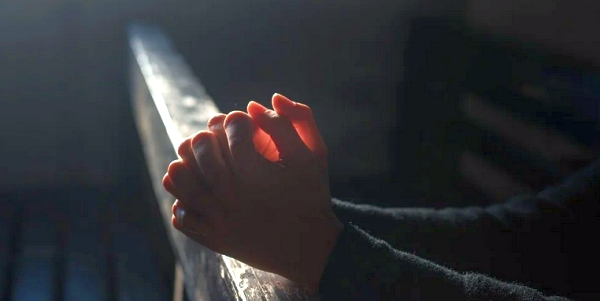 Lord's Prayer banned at funeral because chanting forbidden
under COVID-19 laws 1