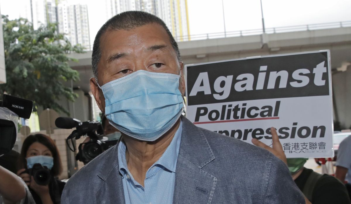 Hong Kong police raids outspoken media tycoon's
office 1