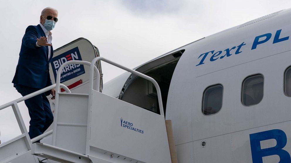 Aviation staffer who has flown with Biden tests positive for
COVID-19 1