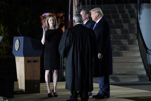 Trump Mimics Coronavirus ‘Superspreader’ Event in Barrett
Swearing In 1