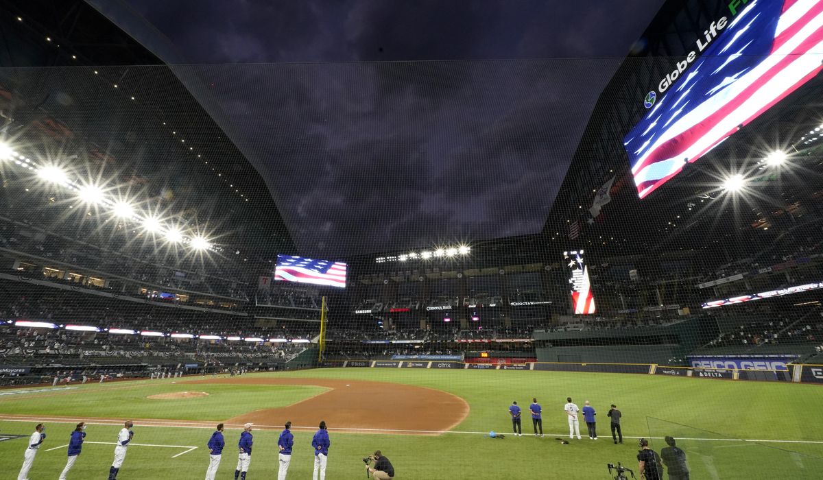 Few fans, masked umps, muted celebrations for World
Series 1