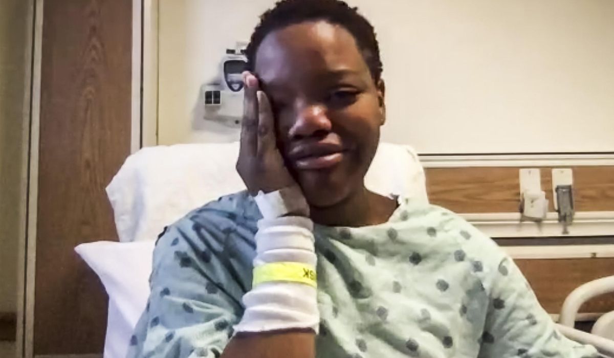 Woman shot by suburban Chicago police sues officers,
city 1