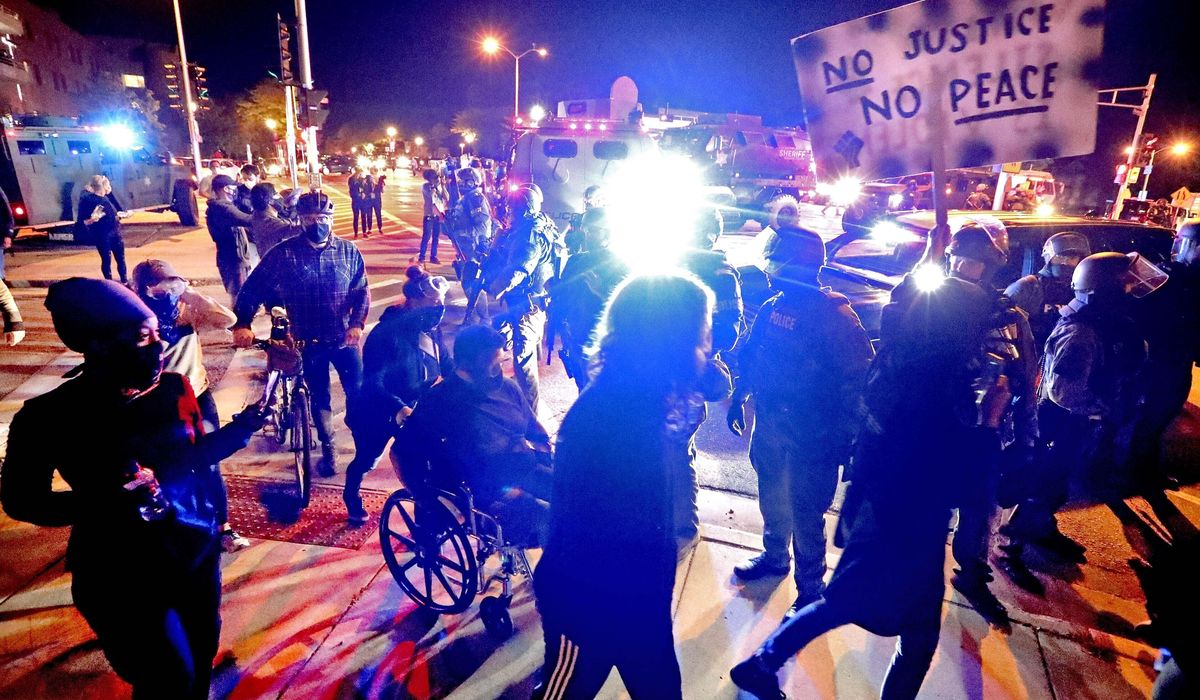 Protests follow clearing of officer in killing of Black
teen 1