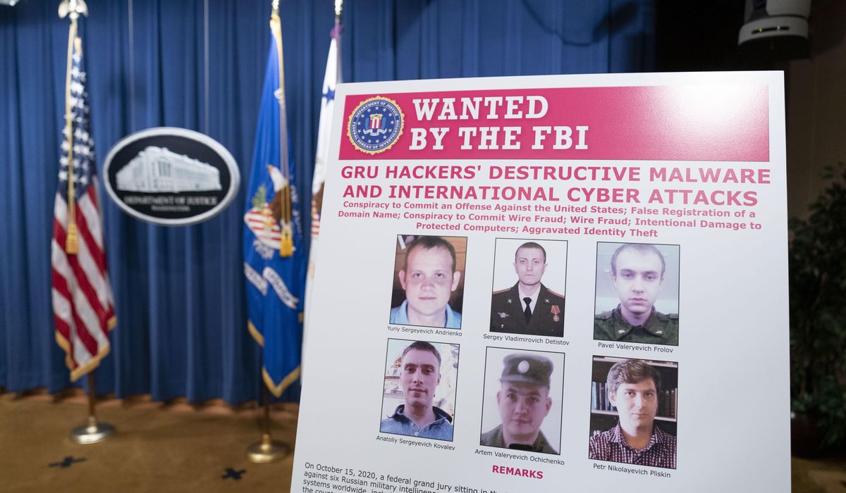 6 Russian officers charged in 'destructive' hacking
campaign 1