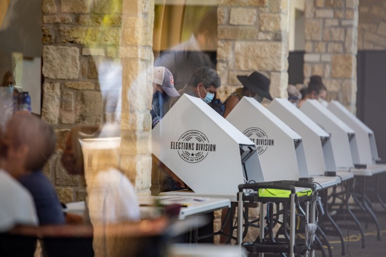Texas Makes Convention Center a Hospital Amid COVID Surge,
Polling-Place Masks Still Optional 1