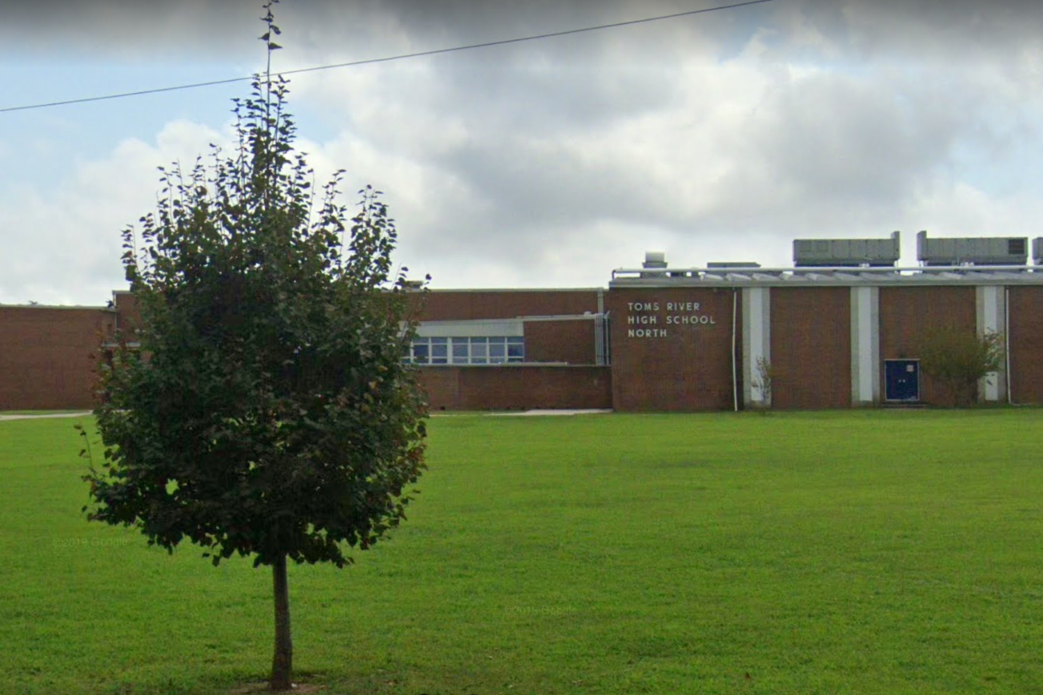 Student's Family Demands School Apology After He Was Asked
to Remove Trump Flag From Wall During Remote Class 1
