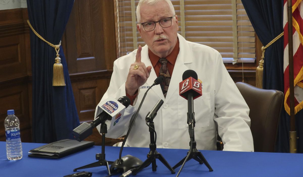 Top health official: Kansas 'losing the battle' on
COVID-19 1