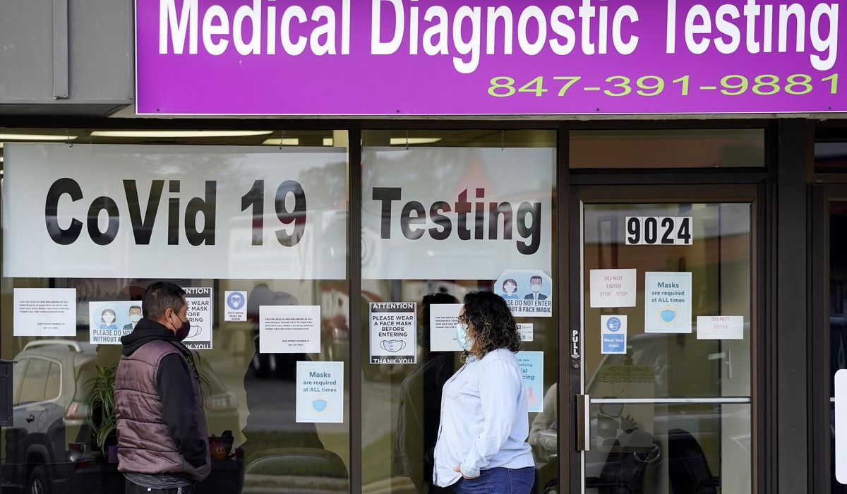 US sets coronavirus infection record; deaths near
224,000 1