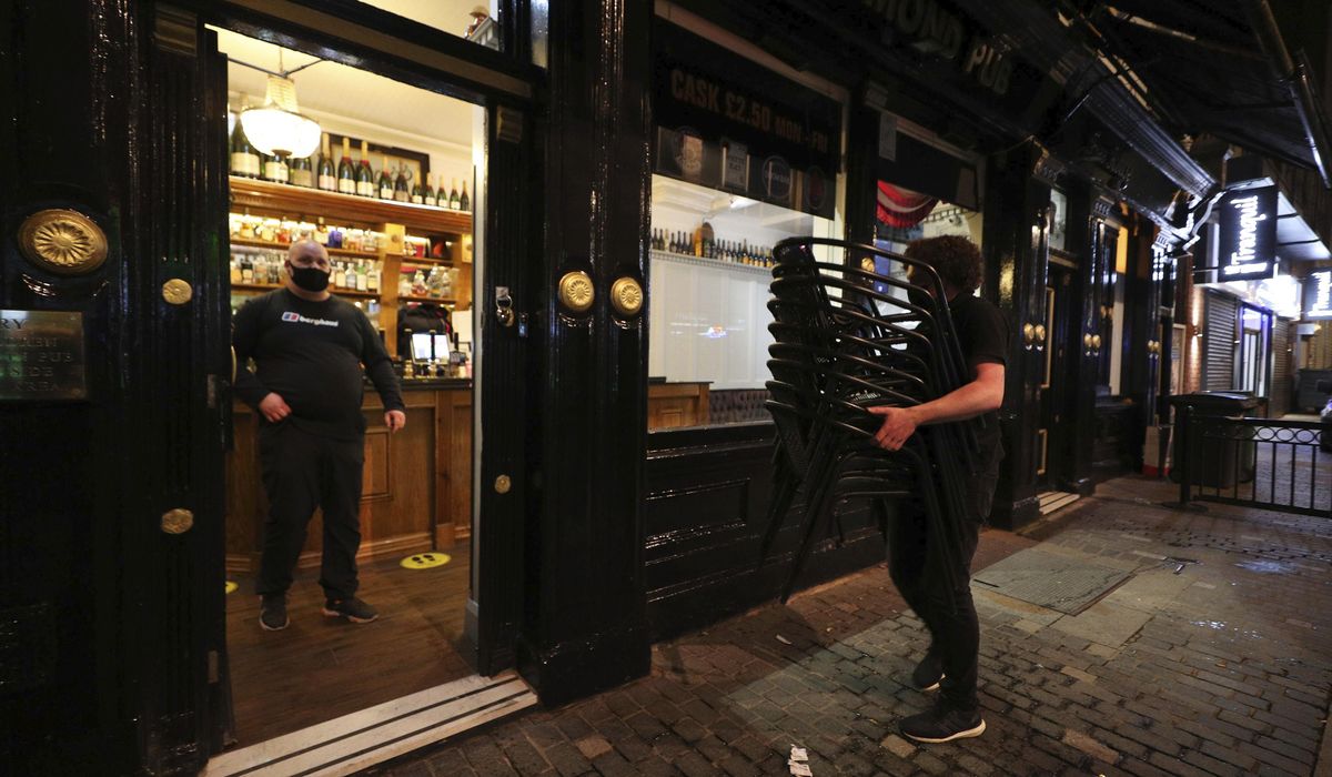 Northern Ireland shuts schools; Liverpool slams
revelers 1