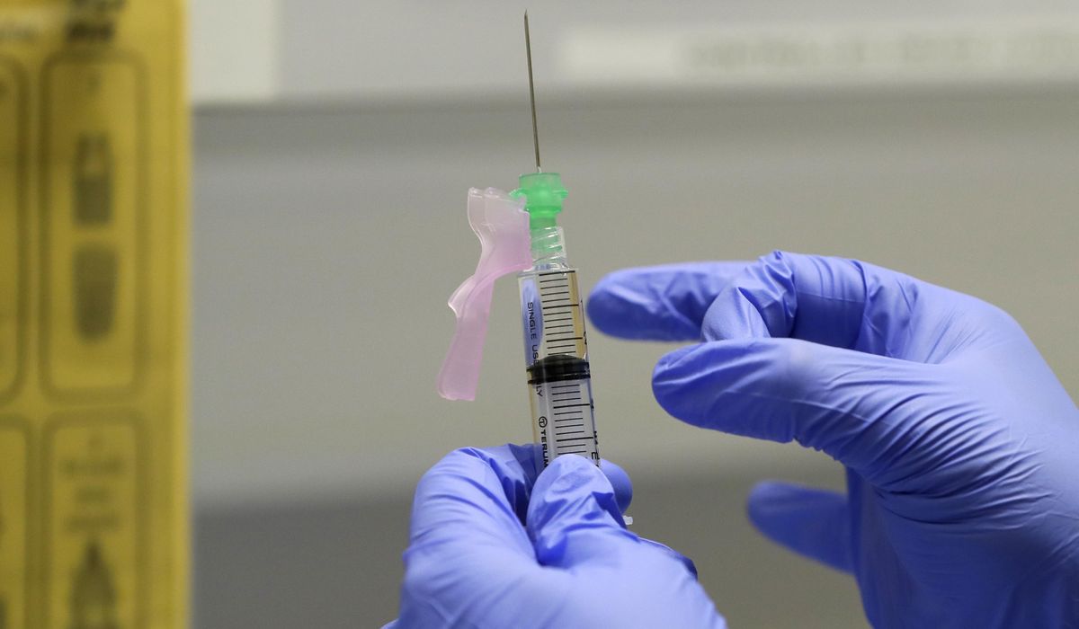 Coronavirus vaccine undercut by Trump, Democrats ahead of
its arrival 1