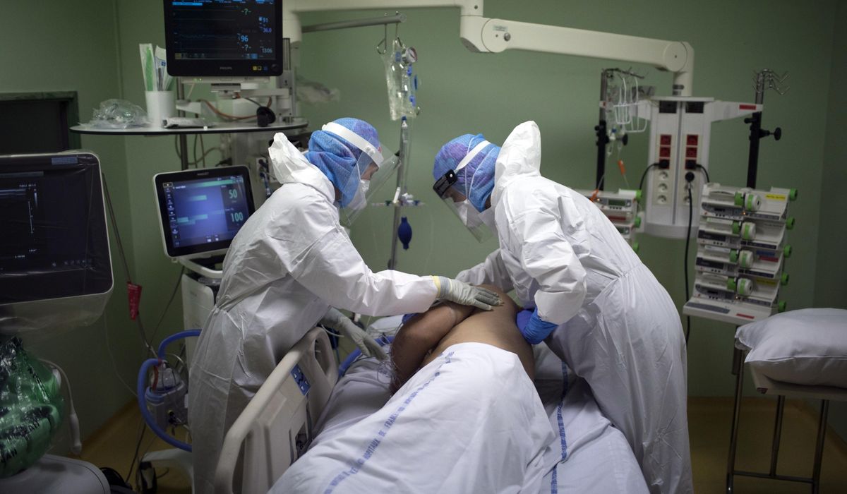 Lockdowns, business rollbacks threatened amid surging
virus 1
