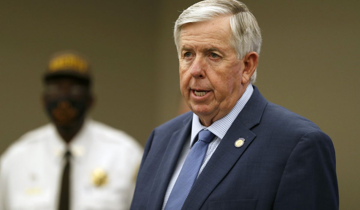 Missouri governor returns to office after battling
COVID-19 1