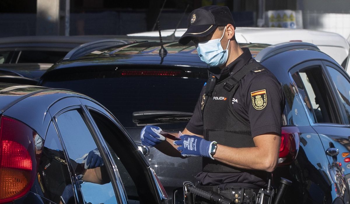 Madrid starts partial virus lockdown amid political
scuffle 1