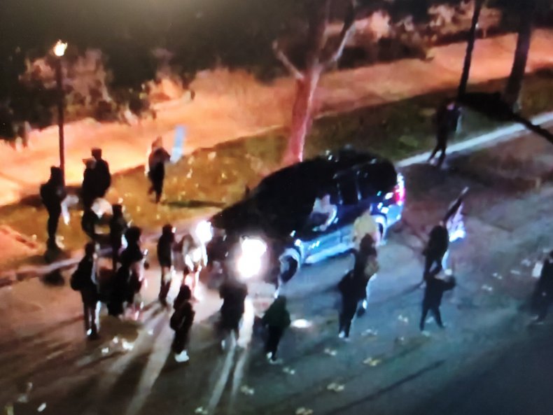 Anti-Trump Protester Arrested After Demonstrators Kick Car,
Try to Open Driver's Door 1