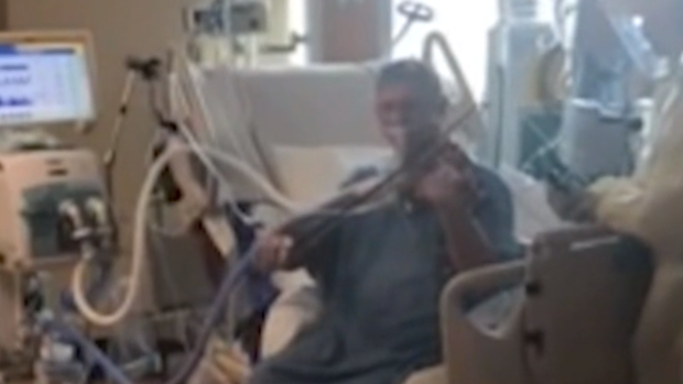 Intubated COVID-19 patient serenades hospital staff with
violin 1