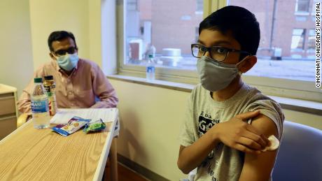 Pfizer says early analysis shows its Covid-19 vaccine is 90%
effective 1