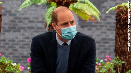 Britain's Queen Elizabeth seen in face mask for first time
during public ceremony 1