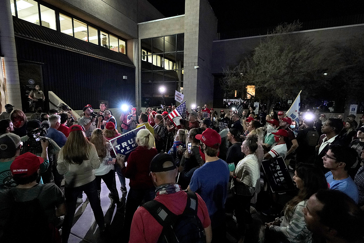 Arizona election chief chides protesters who gathered
outside county center 1