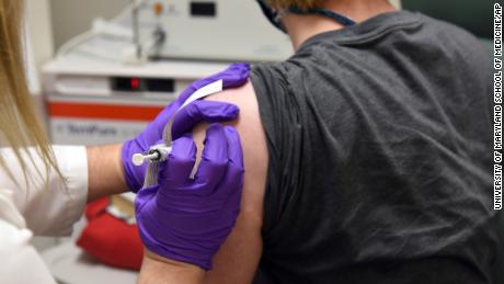 The scientists who developed the Pfizer/BioNTech Covid-19
vaccine are a Turkish-German power couple 1