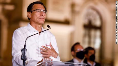 Dozens wounded in Peru as protesters and police clash amid
political crisis 1