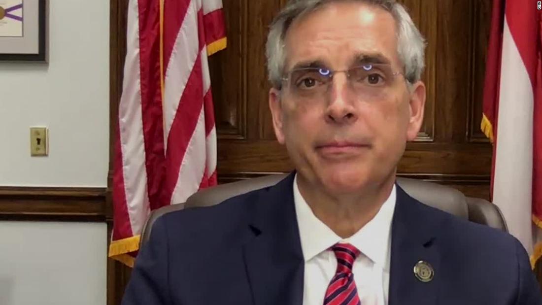 Georgia secretary of state in quarantine as state prepares
full by-hand count of presidential ballots 1