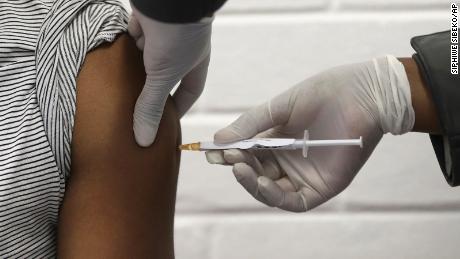 People need to be told they may feel sick after getting
Covid-19 vaccine, CDC committee says 1