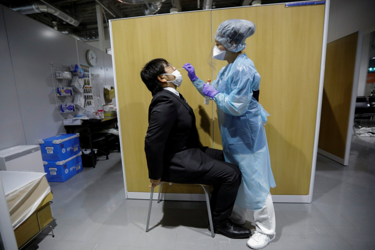 Japan opens airport COVID-19 test lab for departing
travelers 1