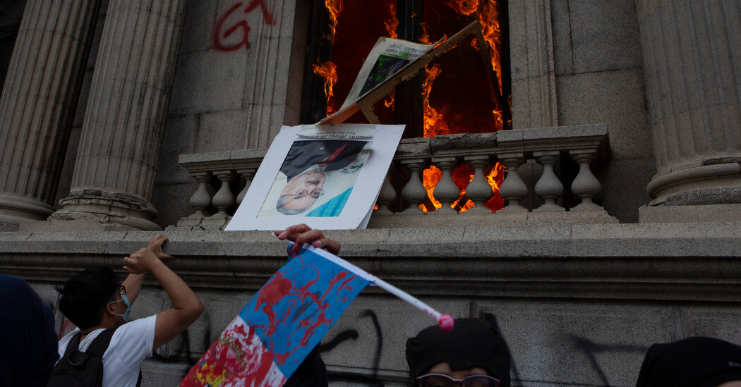 Protesters in Guatemala Set Fire to Congress Building Over
Spending Cuts 1