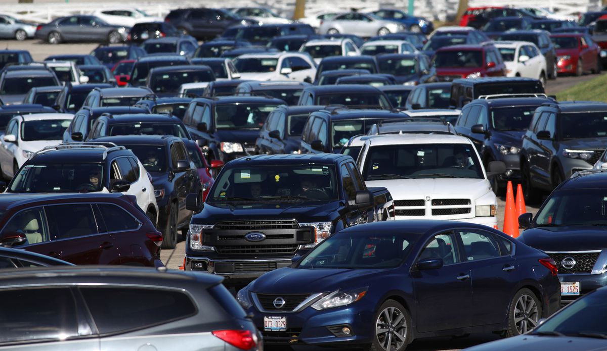 Illinois reports 145 COVID-19 deaths, first triple-digit
toll since early June; another daily record set with 12,657 new and
probable cases 1