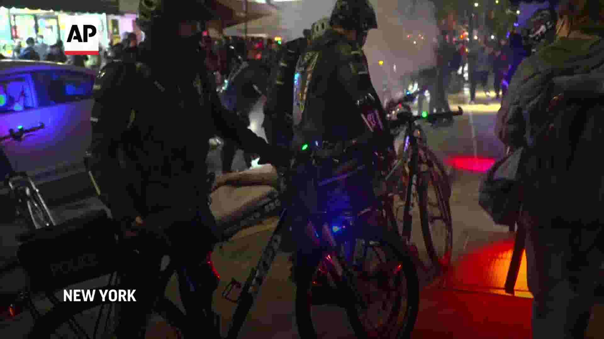 More arrests made after fires set in NYC protest 1