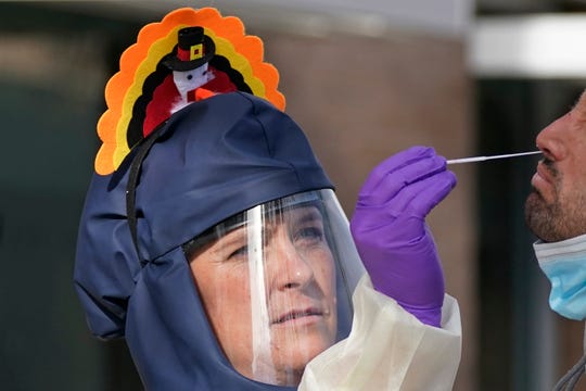 Coronavirus updates: As Joe Biden urges unity, CDC projects
up to 321K deaths by Dec. 19; 1 out of every 145 infected in Los
Angeles County 1