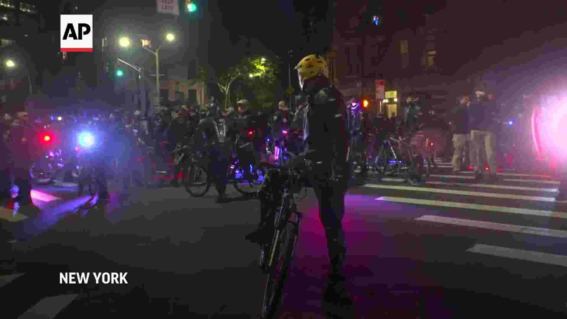 Arrests after protesters set fires in NYC 1