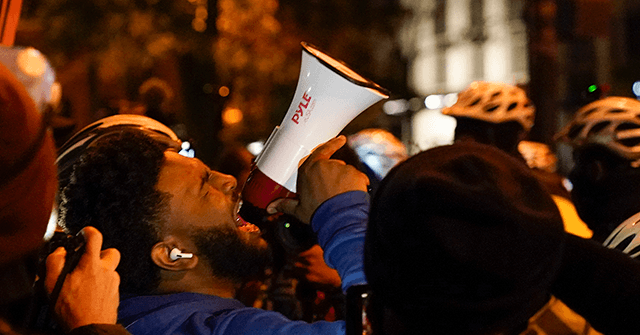 Watch: BLM Protesters Attack D.C. Cops: ‘F*ck You, You
F**cking Uncle Tom' 1