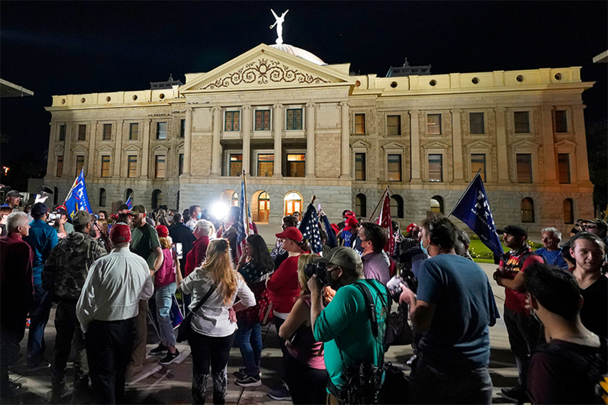 Trump supporters protest outside Arizona election center as
mail-in votes tallied 1