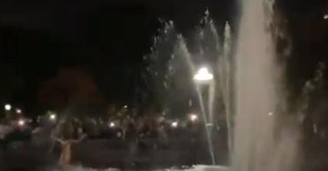 NYC Protests: Naked Reveler Dances in Fountain 1