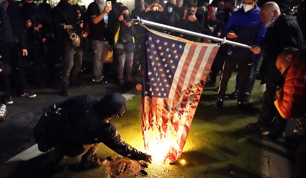Portland riots rage over vote count; National Guard
activated 1