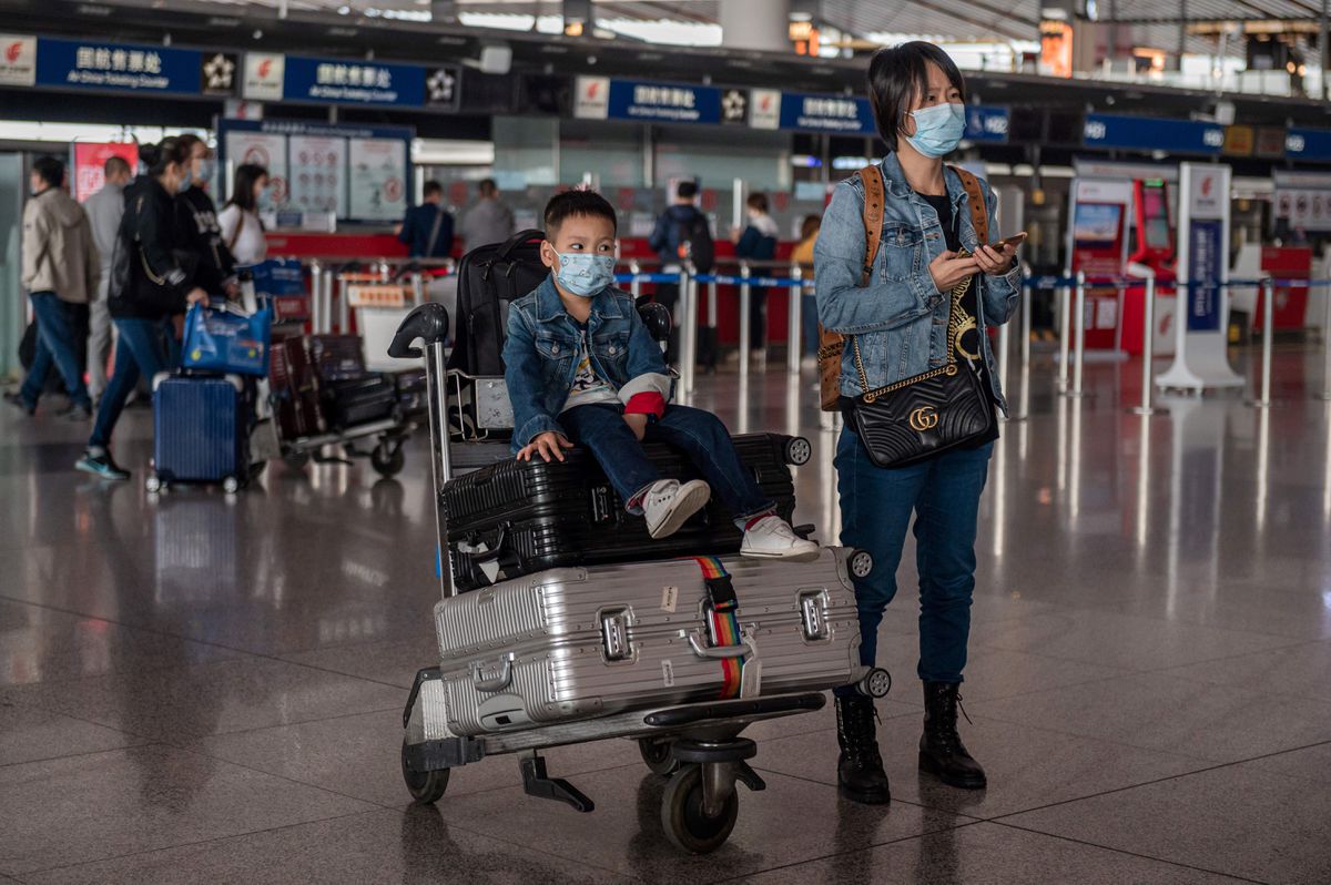 China bans travelers from several countries and tightens
testing on other arrivals as coronavirus resurges worldwide 1 China bans travelers from several countries and tightens
testing on other arrivals as coronavirus resurges worldwide 1